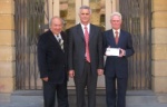 Ali with Colin Mulcahy and Minister of Posts on the occasion of publication of Royal Wedding Stamps